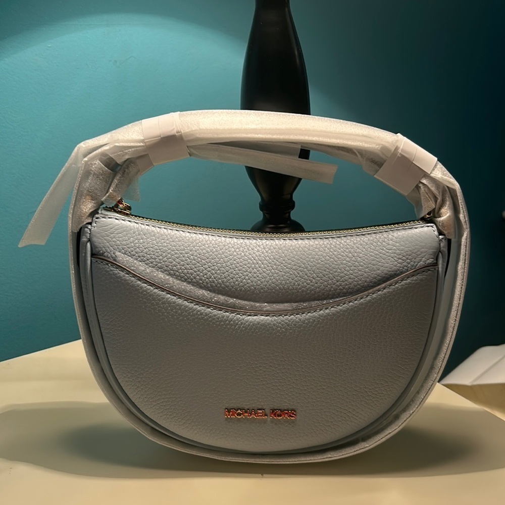 Michael Kors sky blue half moon shoulder bag